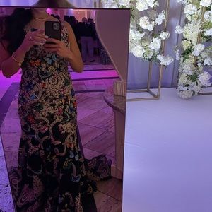 Black dress with gold lacing, lots of colorful butterflies all around 🦋✨